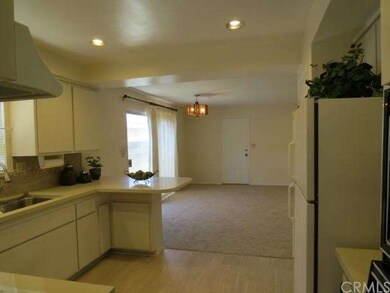 View of Kitchen and Family Room from the Dining Ro