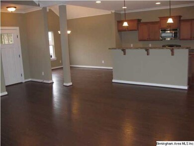 A view from the Great room into the Kitchen (on th