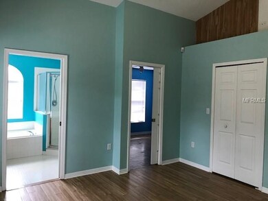 Master bath, pocket door to 2nd bedroom and walk i