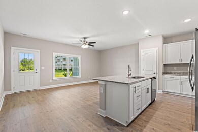 Kitchen featuring light hardwood / wood-style floo