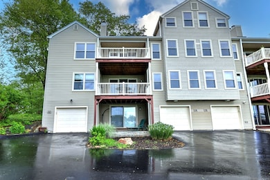 Garage and (upper) back deck that faces the Branford river.