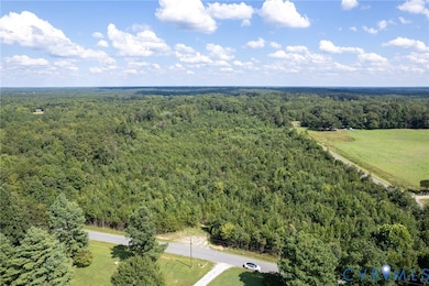 Drone / aerial view of a heavily wooded area