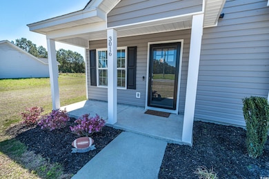Entrance to property with covered porch