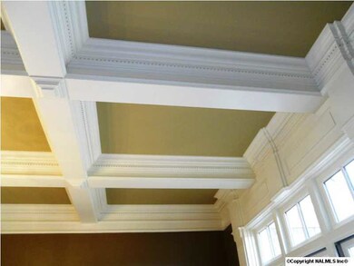 Detailed dental molding in coffered ceiling