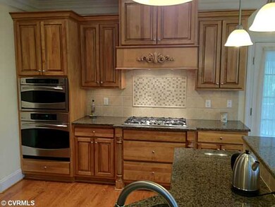 Kitchen - Stunning Custom Cabinets and Marble Back