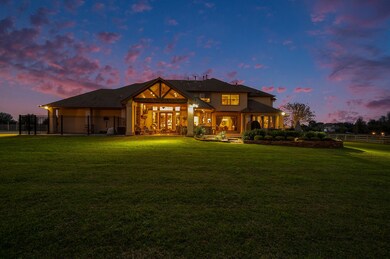 Beautiful twilight photo of the back of the home.