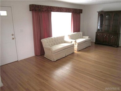 Living Room Living Room has bright windowed wall+h
