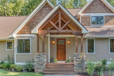 Welcome Home!  Douglas Fir trusses, cultured stone