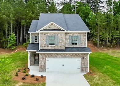 View of front of house featuring a front lawn and 