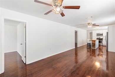 Open floorplan, lots of light and shiny hardwood f