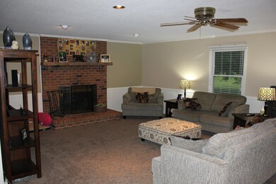 Huge Living Room with Wood Burning Fireplace!