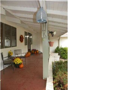 Spacious covered front porch to welcome guests.