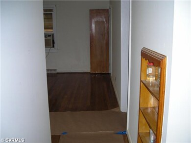Living Room - Refinished wood floors throughout except kitchen and bath.