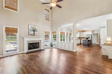 Beautiful refinished hardwood floors with gas fire