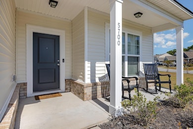 Property entrance featuring a porch