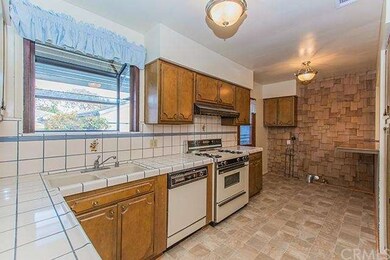 Super clean kitchen with backyard access. Laundry 