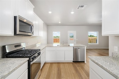 Spacious and functional kitchen layout with breakf