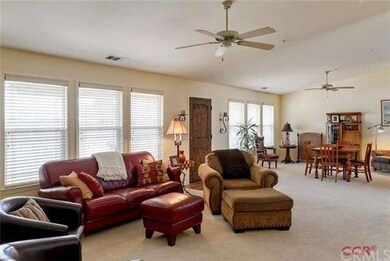 The great room is warm and inviting and allows for