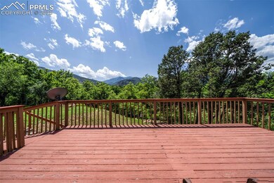 Wooden deck featuring a mountain view