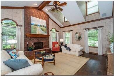 Enjoy the spacious great room with a two-story bri