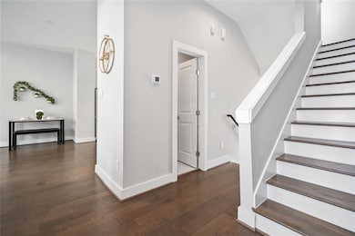 The second floor boasts a spacious living room wit