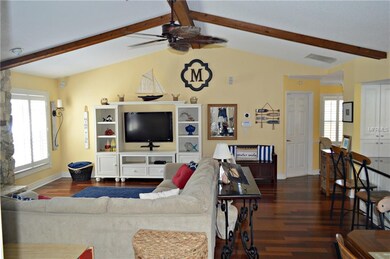 Family room with vaulted ceilings and knotted pine