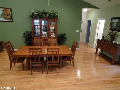 Dining Room - Beautiful wood floors and Vaulted ce