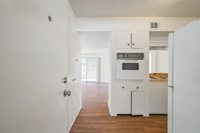 Step into this cozy first-floor corner unit, where