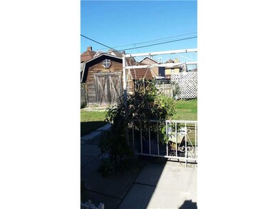 Exterior Back. BACK YARD WITH SHED FOR STORAGE