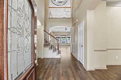 Welcome to a bright and inviting entryway. The ope