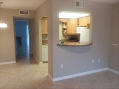 Kitchen Breakfast Bar, Down Hall to Bedroom