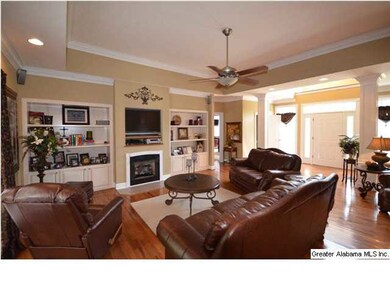 Extra large Great Room with fireplace and french d