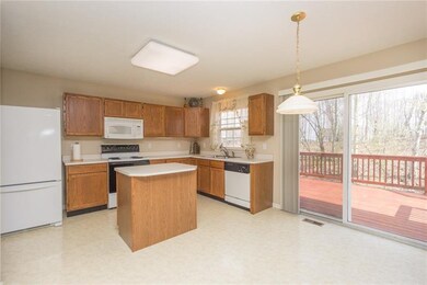 Another view of the kitchen overlooking the deck a