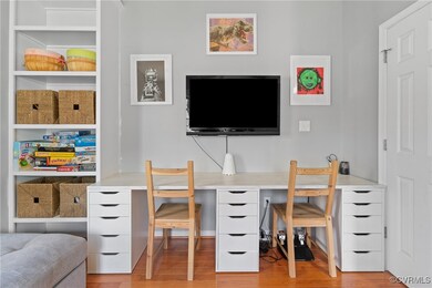 Office space featuring light wood-style floors