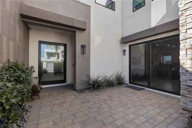 Courtyard with pivot front door