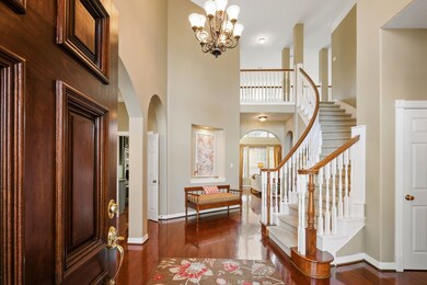 Your guest will get a warm welcome as soon as they enter the front door. To the left is the formal dining, and to the right is the downstairs study/sitting room, and a half bath.