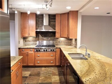 Gourmet kitchen, gas cooking, granite counters, an