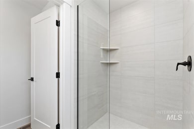 Bathroom with tiled shower