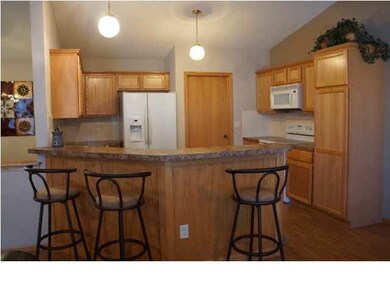 Large Kitchen with eating bar.