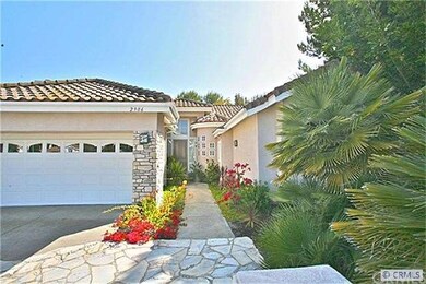 Walking up to the house over the flagstone inlayed