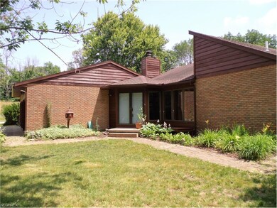 Brick and Redwood Siding