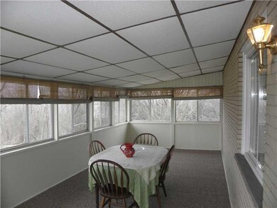 Sunroom. Awesome Sun Porch off Dining Room overloo