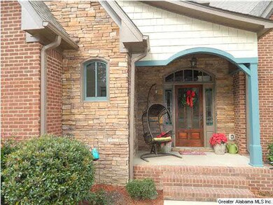 Covered stacked stone porch