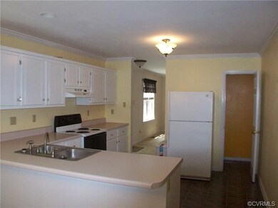Kitchen with attached 1/2 bath.