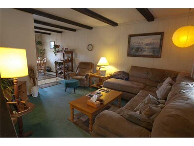 Living Room. Large living room with wooden beams o