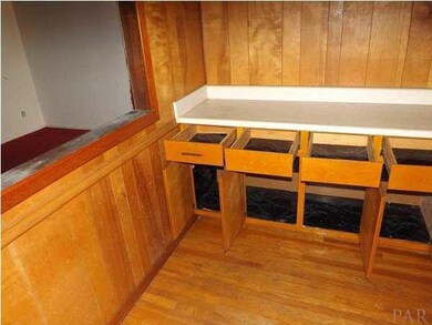 Kitchen area with a lot of cabinets