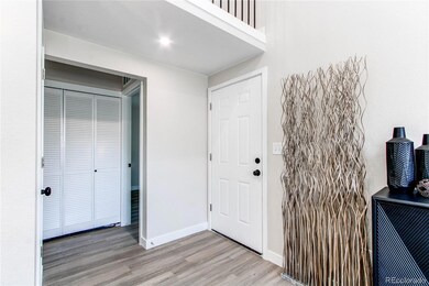 All NEW paint, flooring, doors, hardware!  2 story entrance into living room.