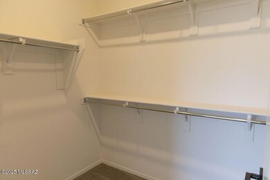 Primary walk-in closet