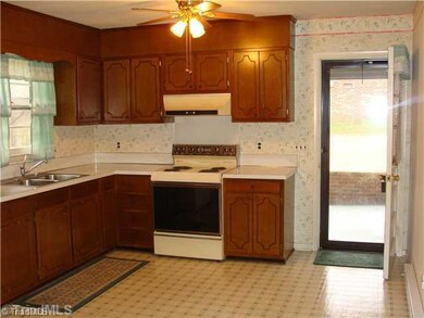 Kitchen. Eat-In Kitchen with Entrance from Carport