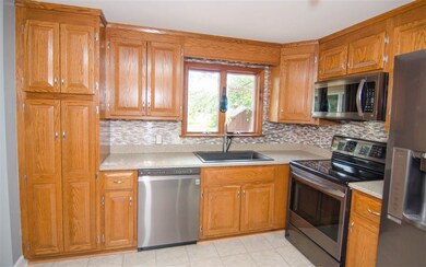 Beautiful kitchen looks over the backyard.